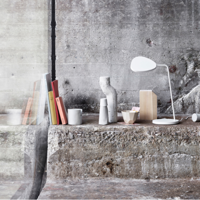 The white Leaf Table Lamp from Muuto in a family area.