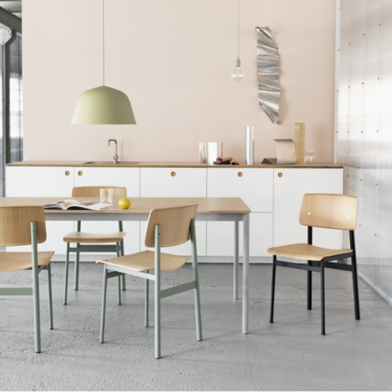 The Loft Chair from Muuto in black and black within a dining room.