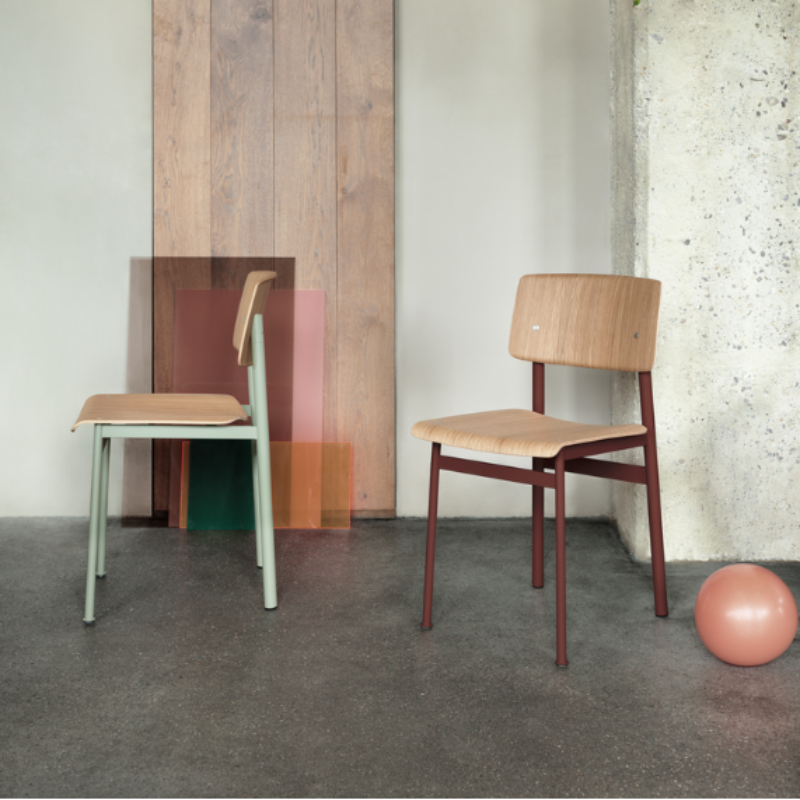 The Loft Chair from Muuto in oak and dusty green in a living room.
