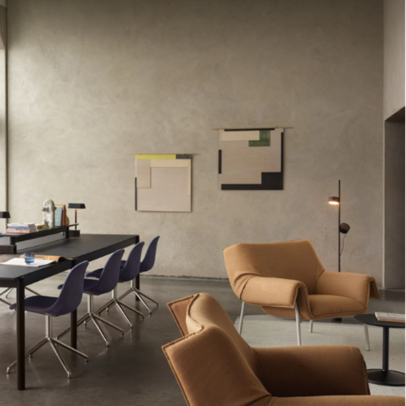 The Post Floor Lamp from Muuto within a business space.
