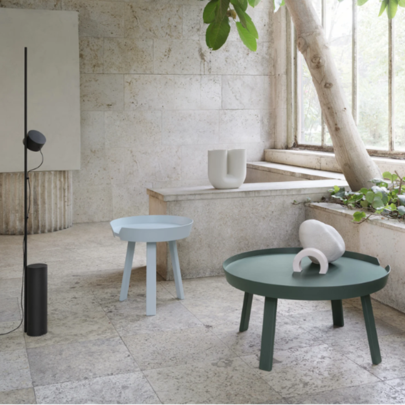 The Post Floor Lamp from Muuto in an indoor garden.