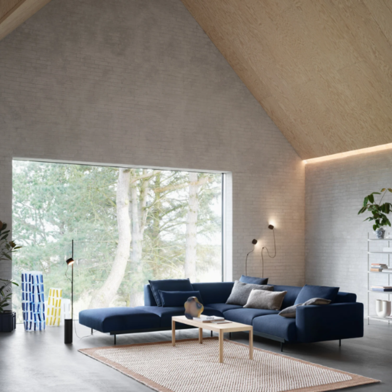 The Post Wall Lamp from Muuto in an open space lounge.