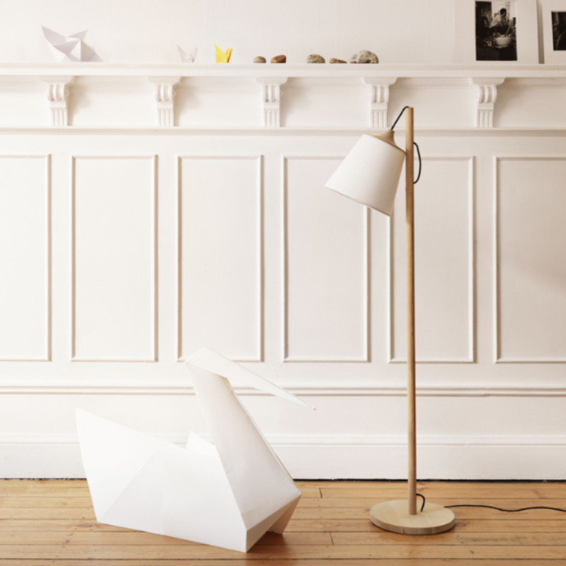 The oak and white Pull Floor Lamp from Muuto in a family space.