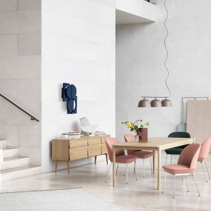 The Reflect SIdeboard Oiled Oak from Muuto in a living room.