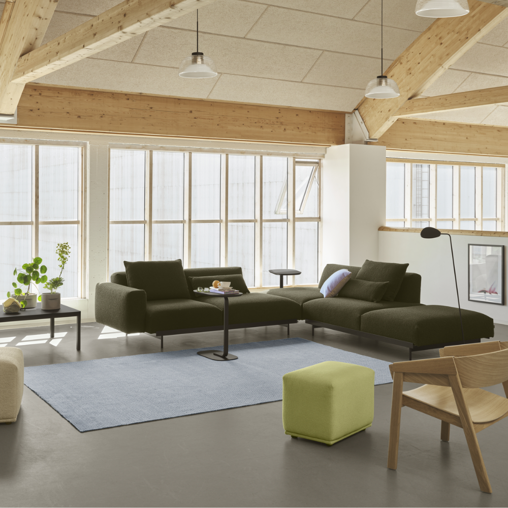 The black Relate Side Table from Muuto in a lounge.