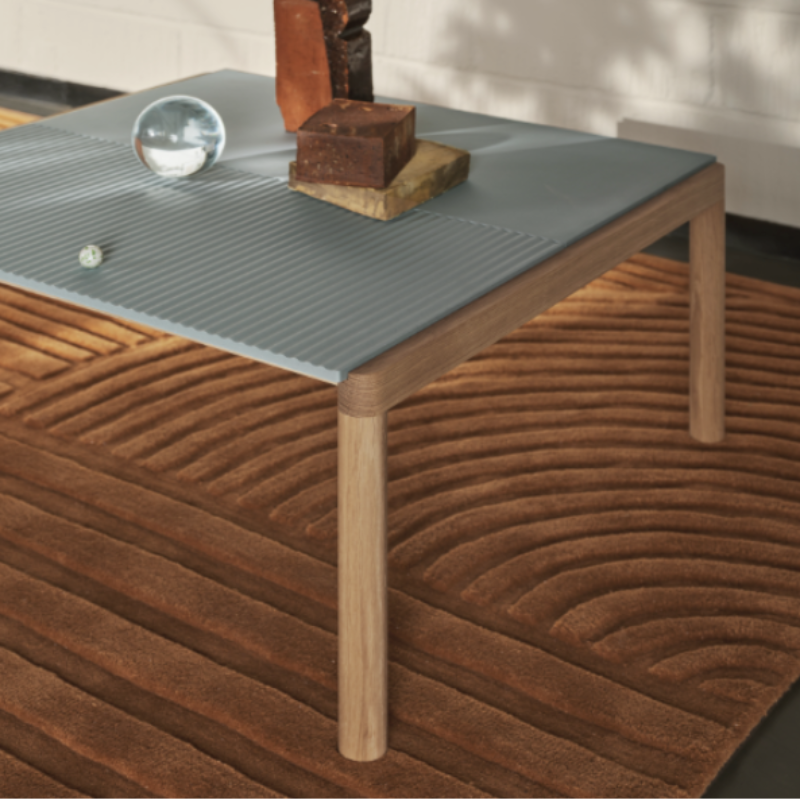 The Relevo Rug from Muuto in a living room.