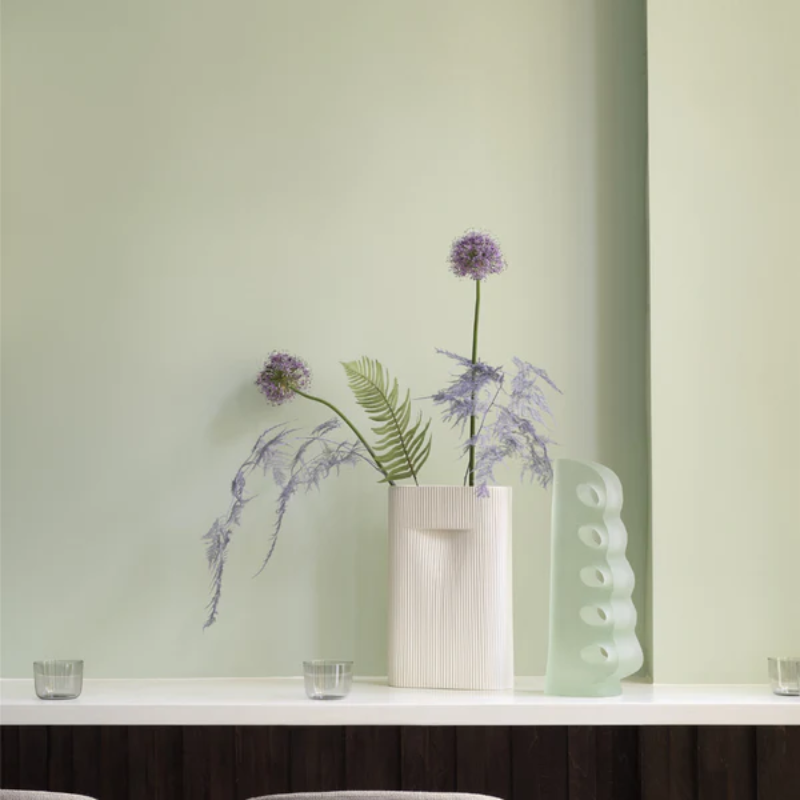 The Ridge Vase from Muuto in off white in a ktichen.