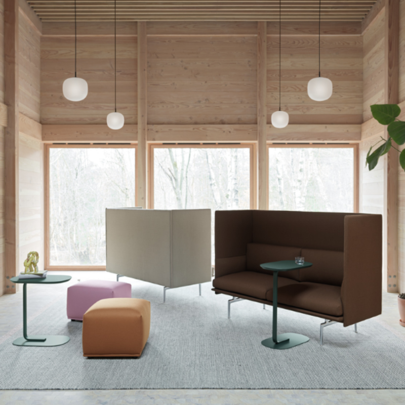 Four black Rime Pendant Lamps from Muuto in a lounge.