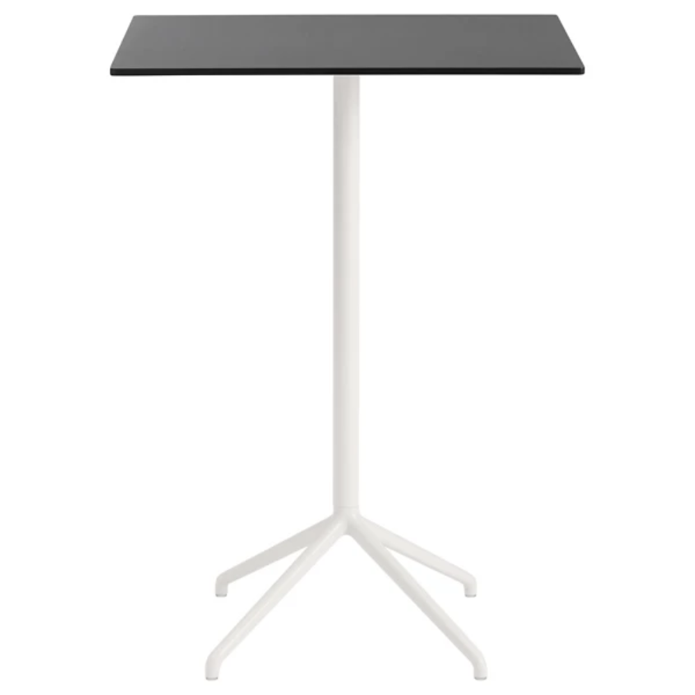 The 41 inch Still Cafe Table from Muuto with the black nanolaminate table top and white frame.