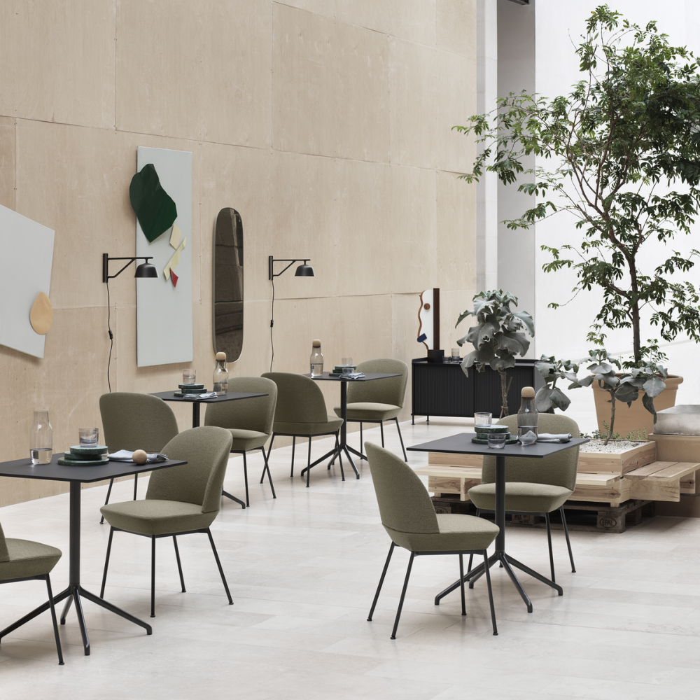 The Still Cafe Table from Muuto in a commercial space.