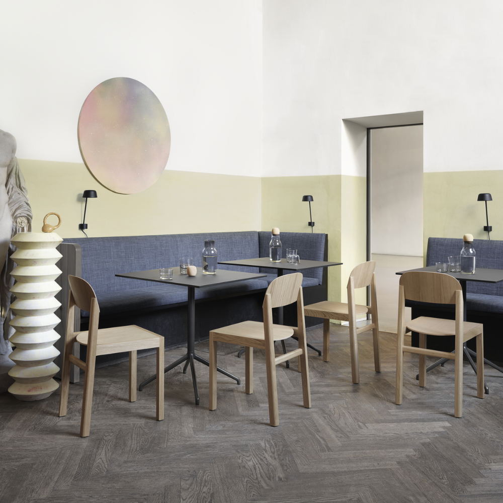 The Still Cafe Table from Muuto in a restaurant.