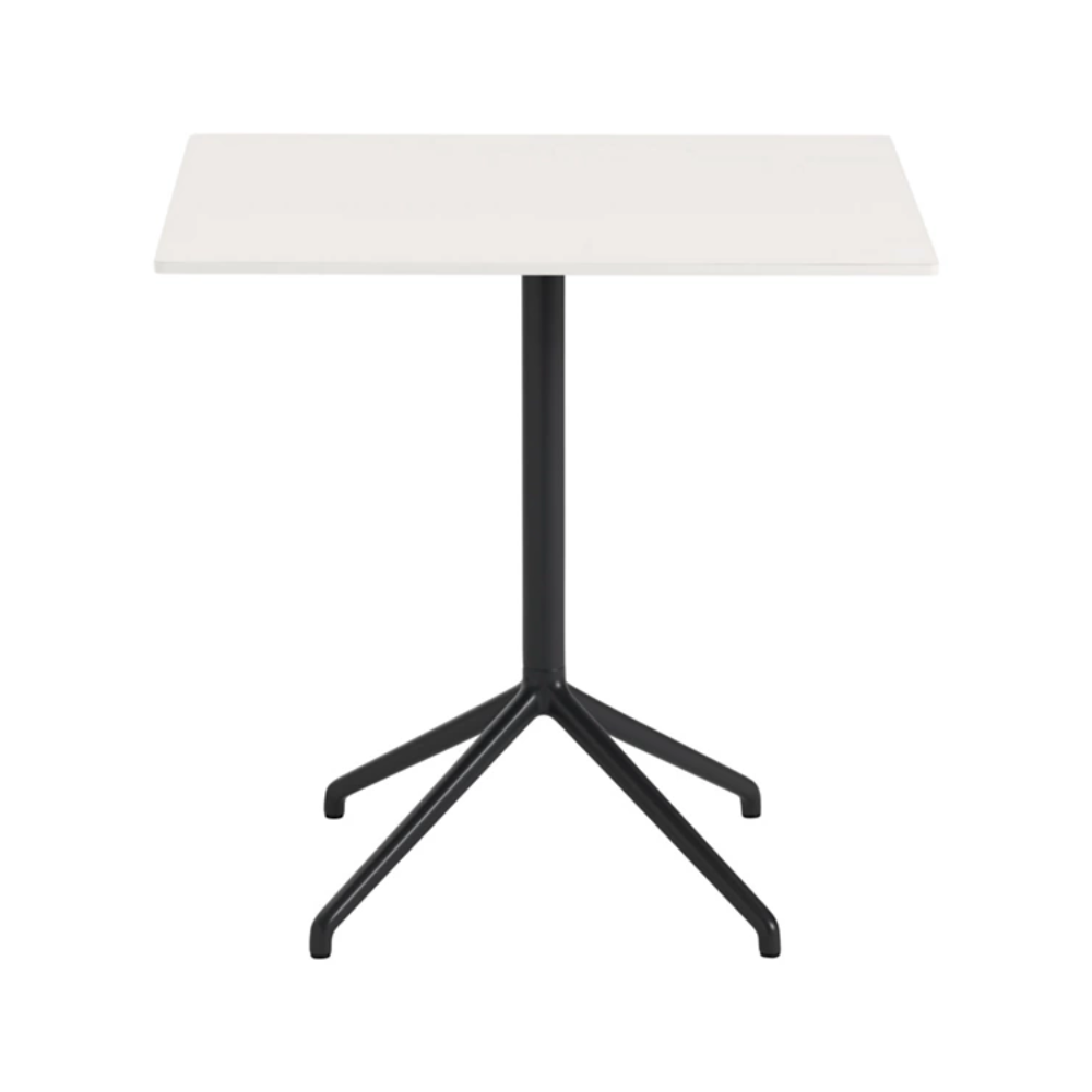 The 29 inch Still Cafe Table from Muuto with the white nanolaminate table top and black frame.