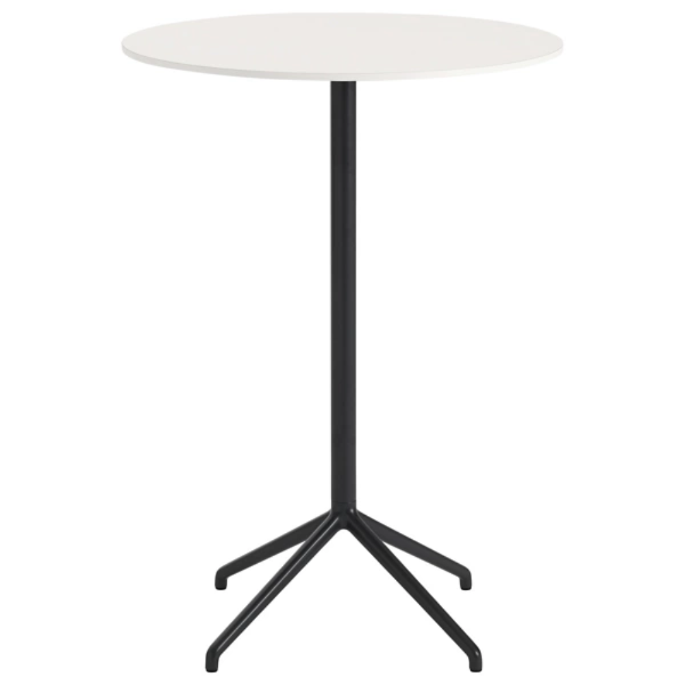 The 41 inch Still Round Cafe Table from Muuto with the white nanolaminate table top and black frame.