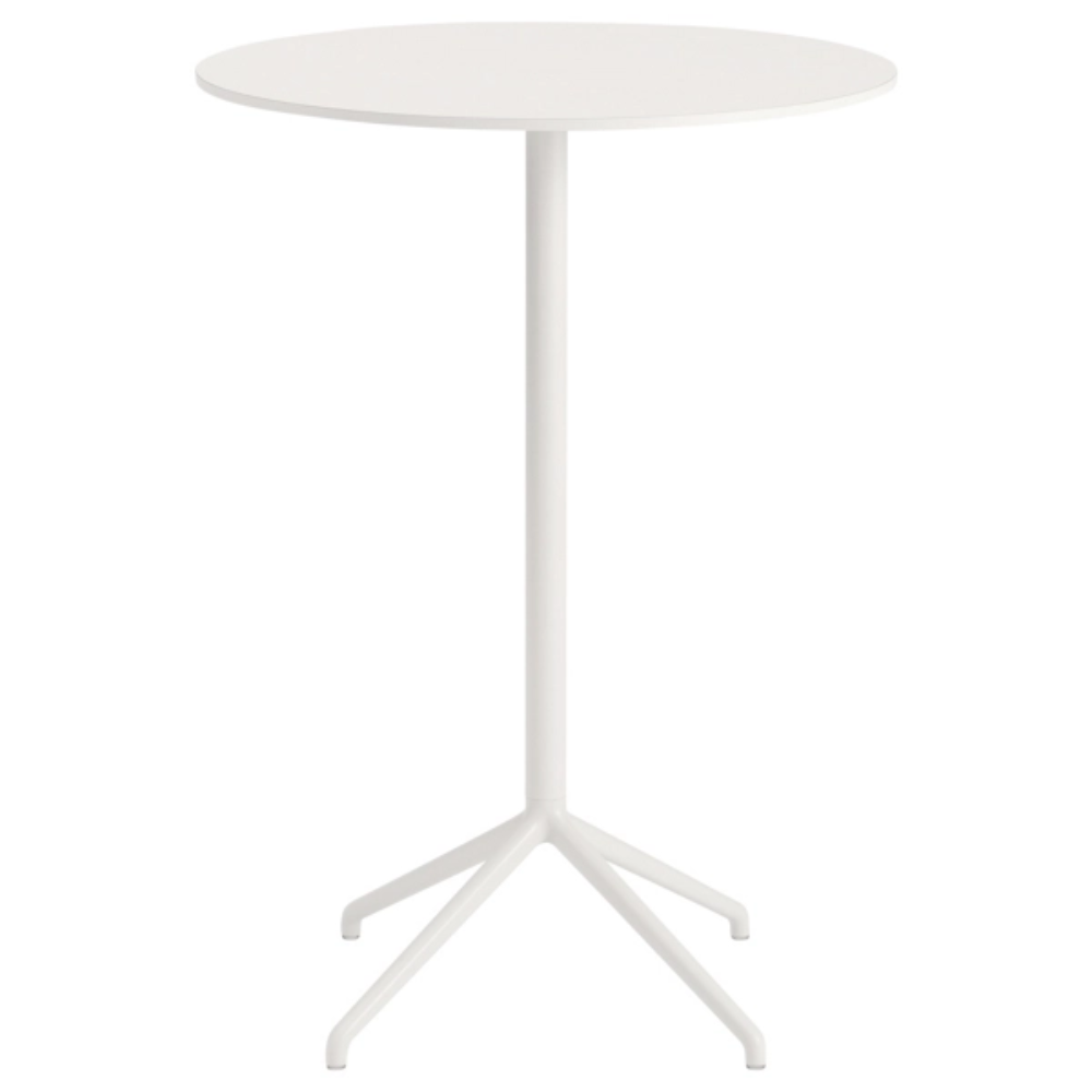 The 41 inch Still Round Cafe Table from Muuto with the white nanolaminate table top and white frame.