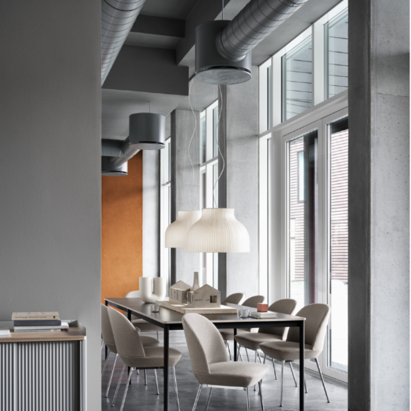 The open Strand Pendant Lamp from Muuto, 23.5 inch size in a business space.