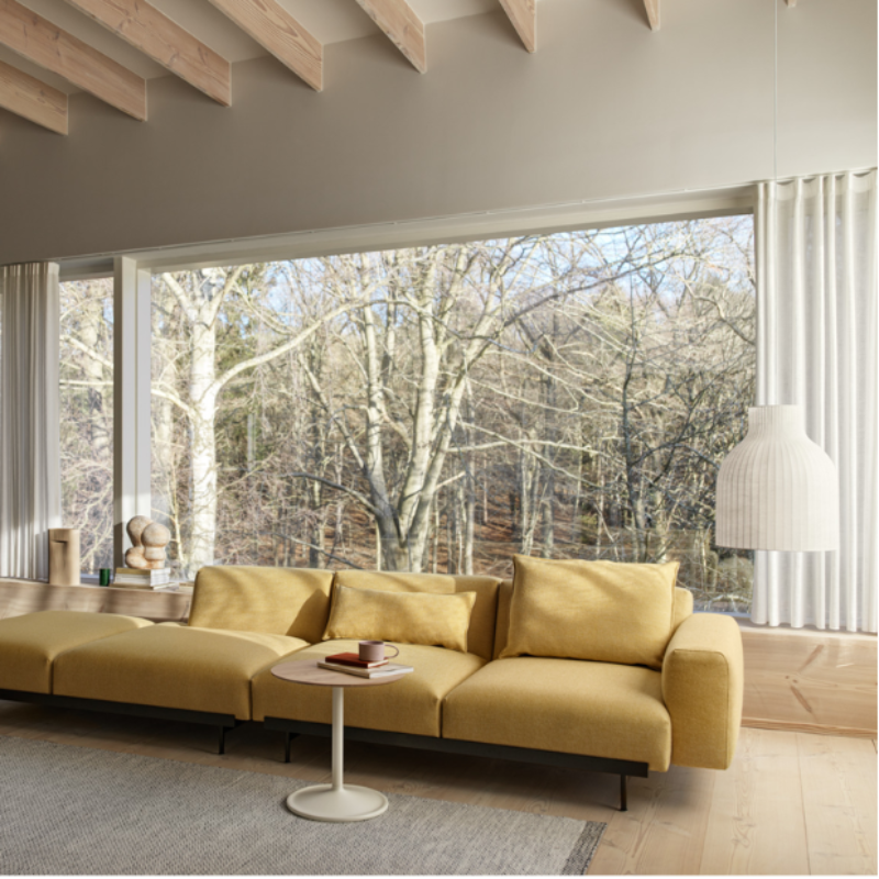 The open Strand Pendant Lamp from Muuto, 16 inch size in a designer home.