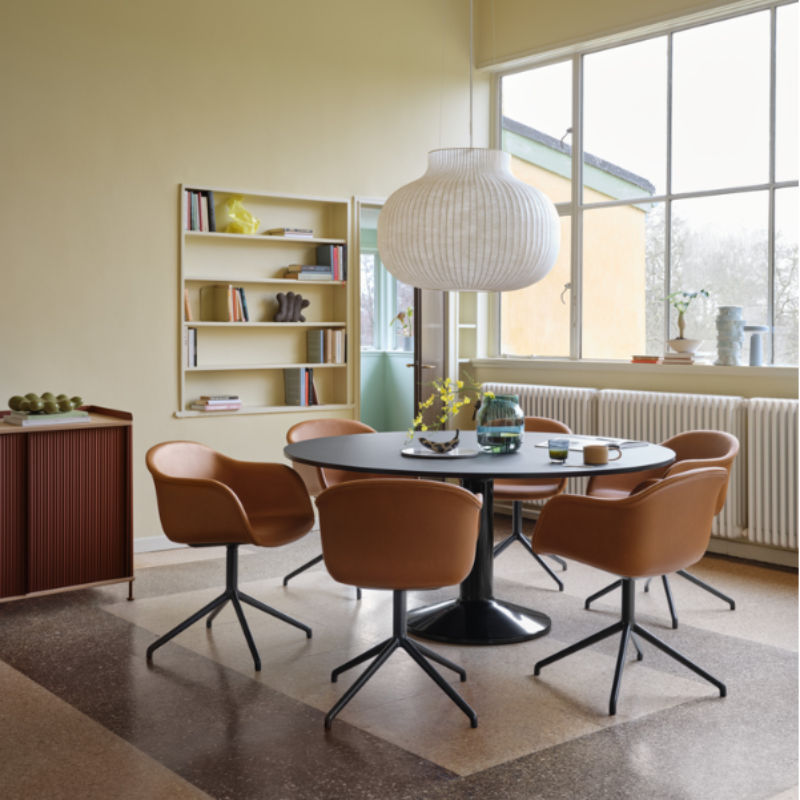 The closed Strand Pendant Lamp from Muuto, 31.5 inch size in a dining room.