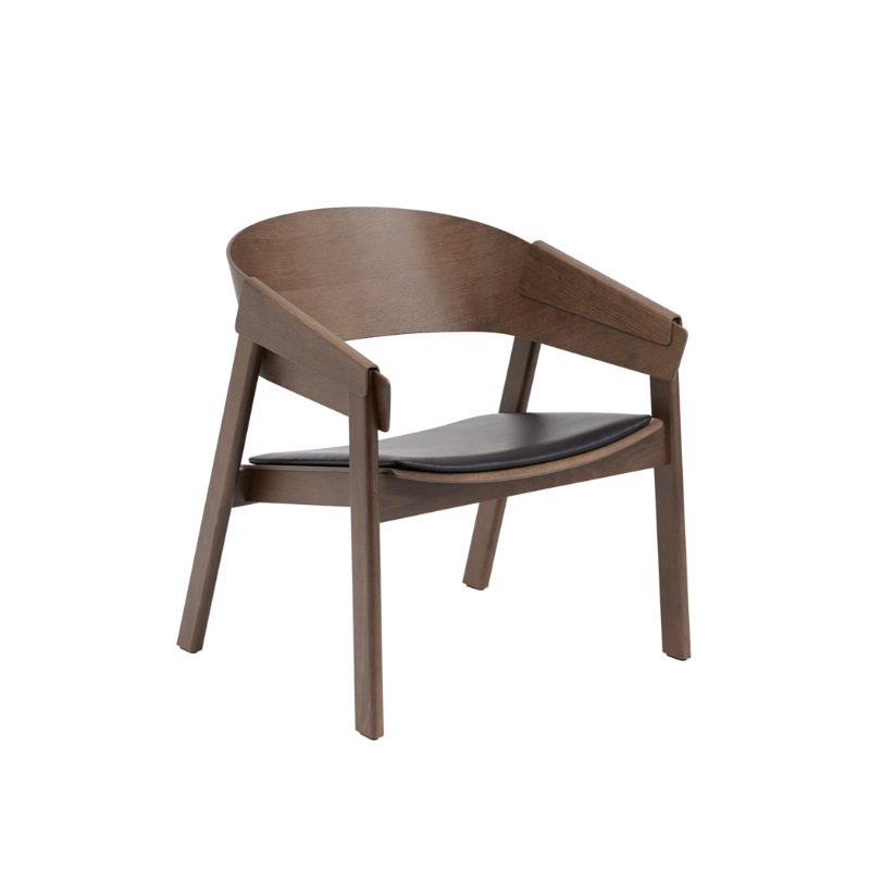 The Upholstered Cover Lounge Chair from Muuto with black refine leather in dark stained brown.