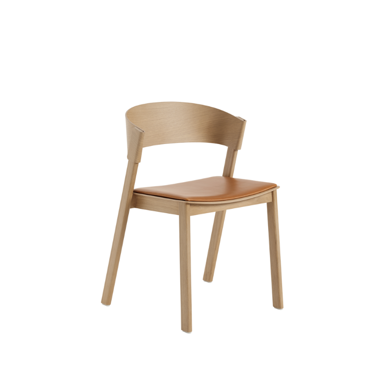 The Upholstered Cover Side Chair by Muuto with cognac refine leather in oak.
