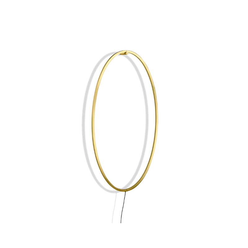 The Ellisse Wall Sconce from Nemo in gold.