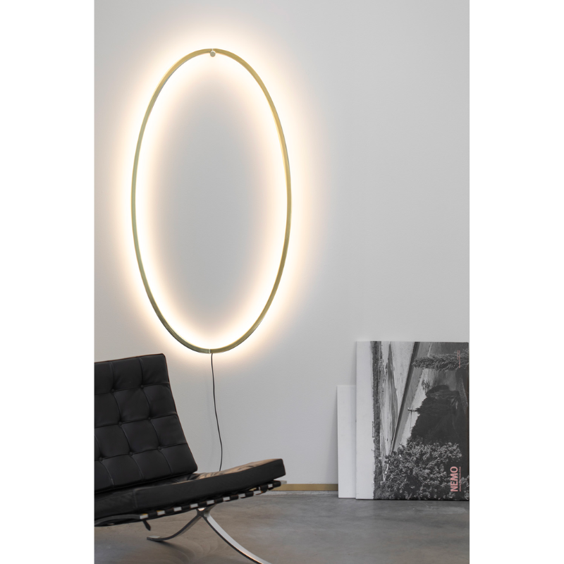 The Ellisse Wall Sconce from Nemo in a living space.