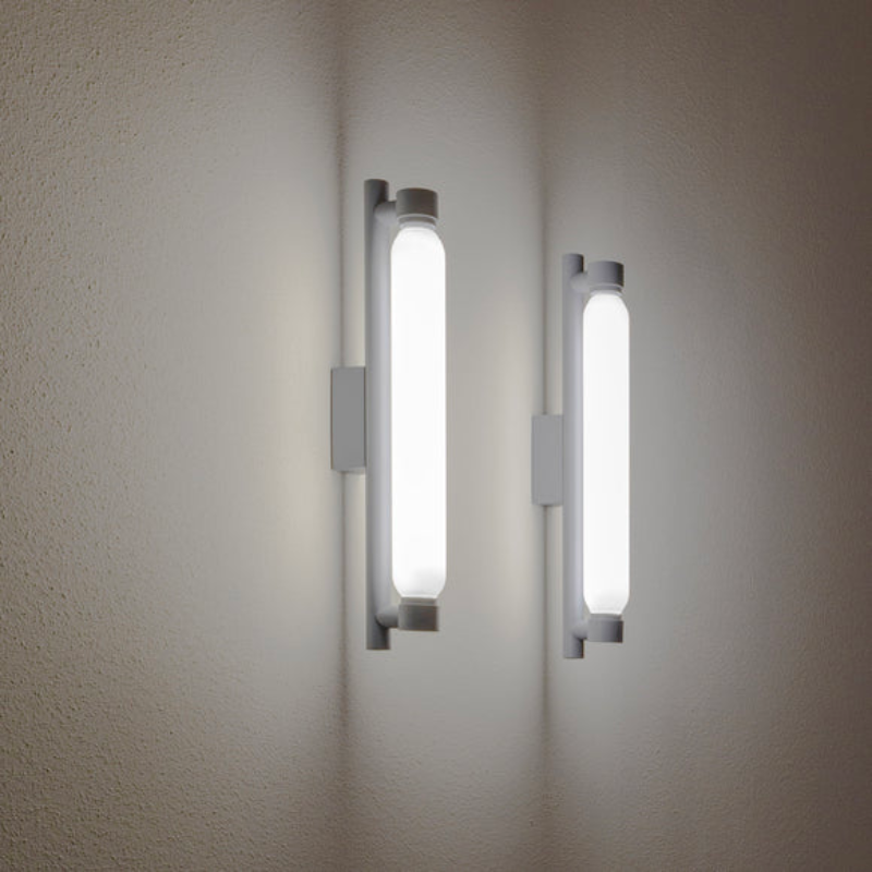 The La Roche Wall Sconce from Nemo in gray in an office.