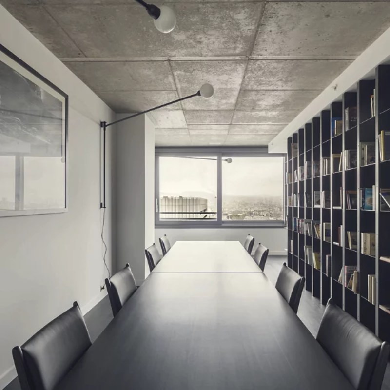 The Potence Pivotante Wall Sconce from Nemo in a business.