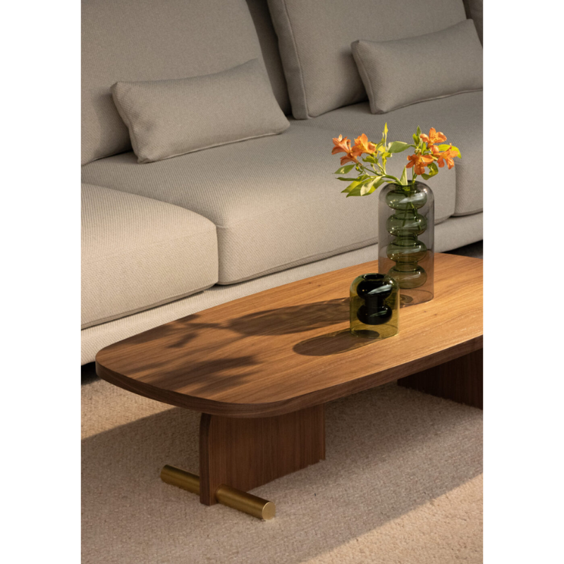 The walnut and brass Nova Coffee Table from Nomon in a living room.