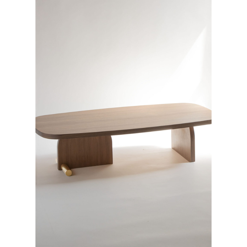 The walnut and brass Nova Coffee Table from Nomon in a studio.