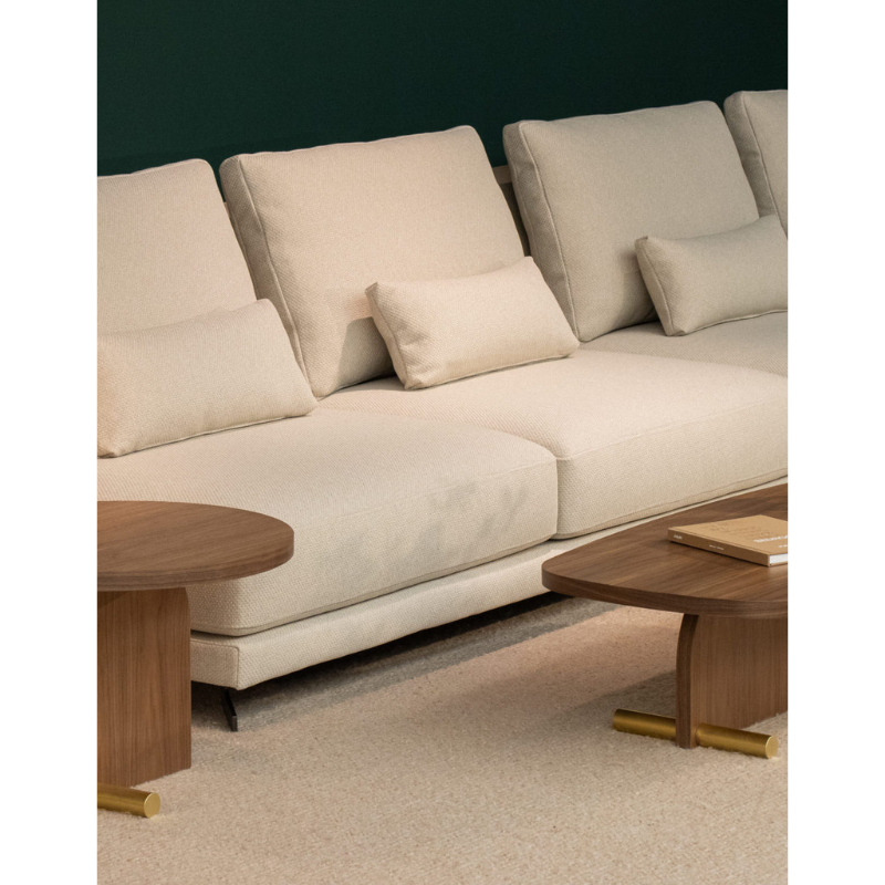 The small wlanut and brass Nova Side Table from Nomon in a living room.