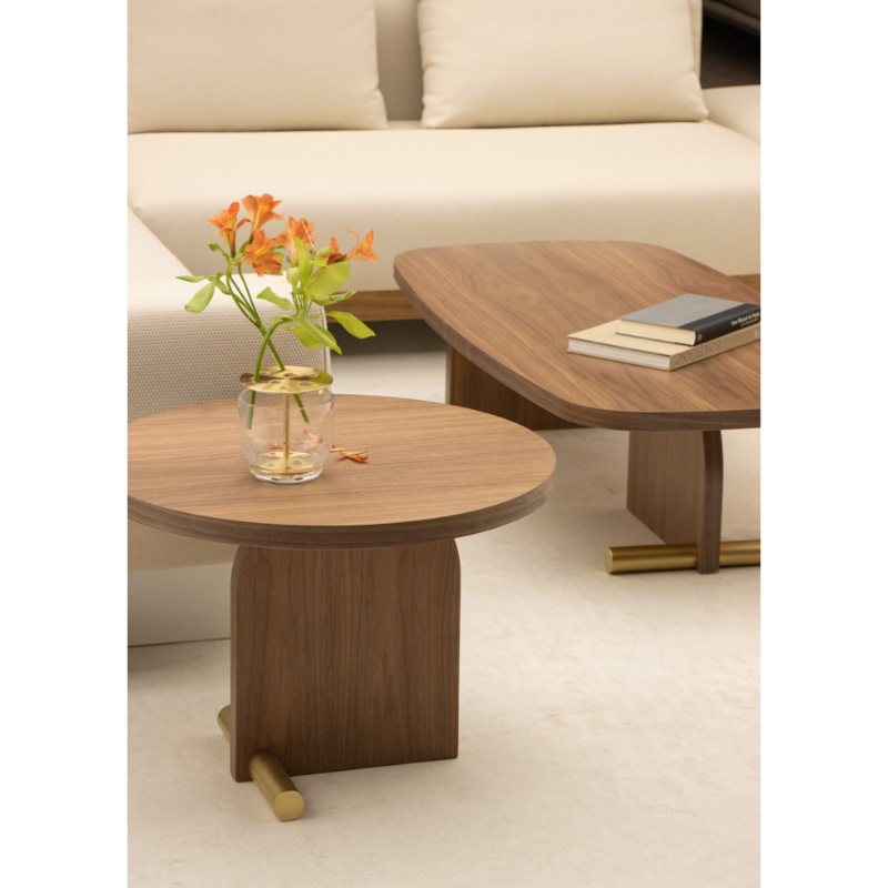 The small walnut and brass Nova Side Table from Nomon in a living space.