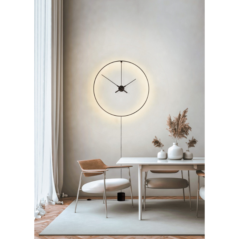 The plug-in Ombra Clock from Nomon in a living room.