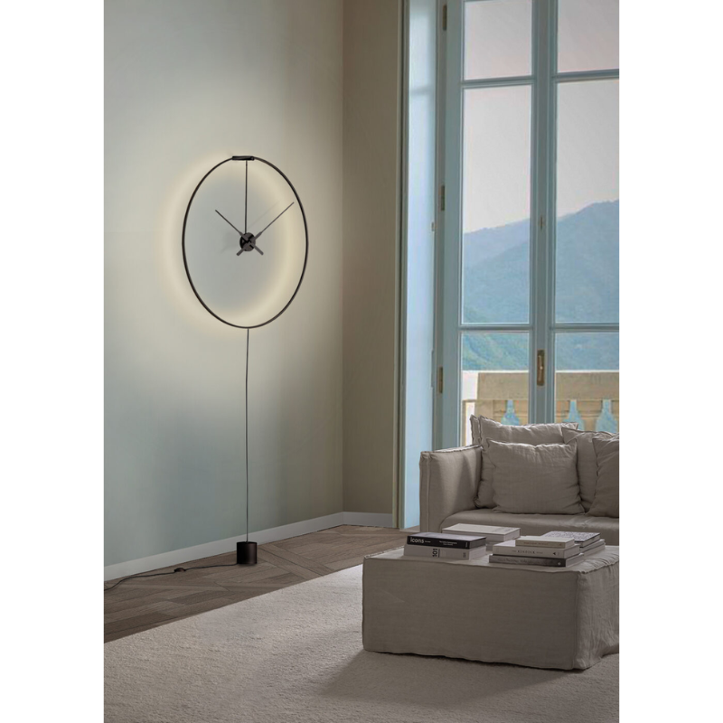 The plug-in Ombra Clock from Nomon in a lounge.