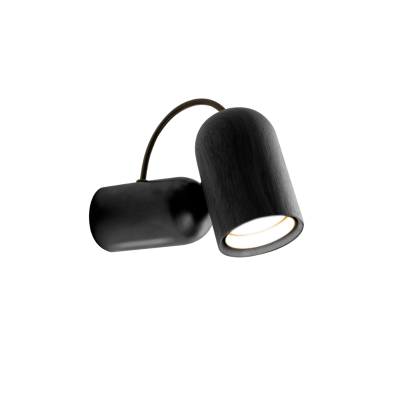 The Onfa Wall Lamp from Nomon in the black stained ash with graphite finish.