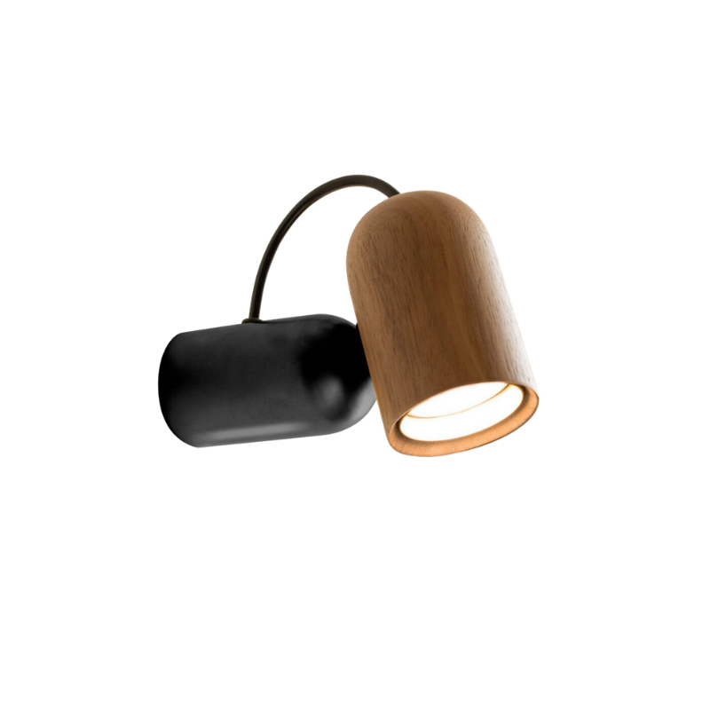 The Onfa Wall Lamp from Nomon in the walnut with graphite finish.