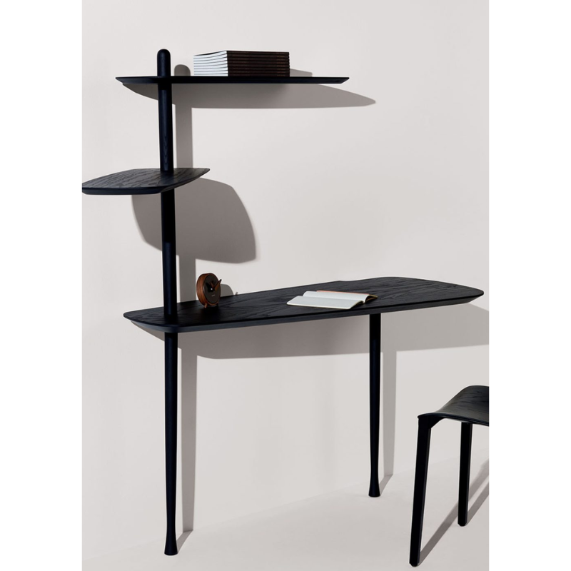 The black ash Unica Escritorio Desk from Nomon used for writing.