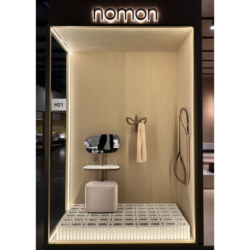 The small Vertigo Wall Hanger from Nomon in a bathroom display.