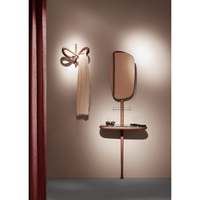 The small Vertigo Wall Hanger from Nomon in a living room.