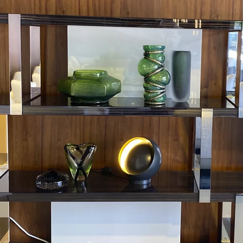 The Eva Table Lamp from Oluce in a living room.