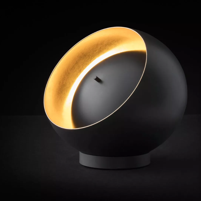 The Eva Table Lamp from Oluce in a studio.