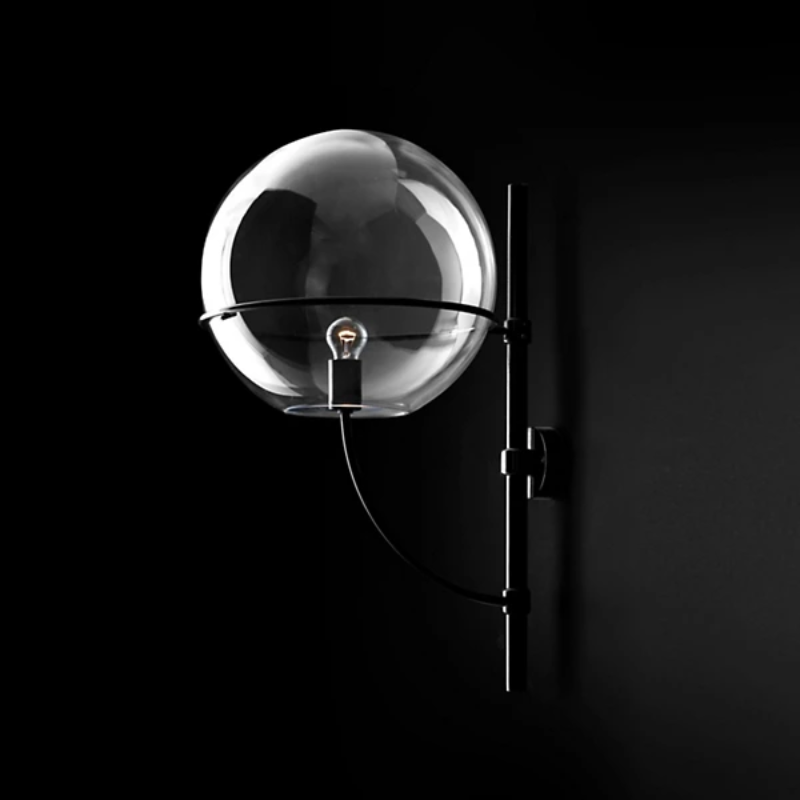 The Lyndon Outdoor Wall Sconce from Oluce in a studio.