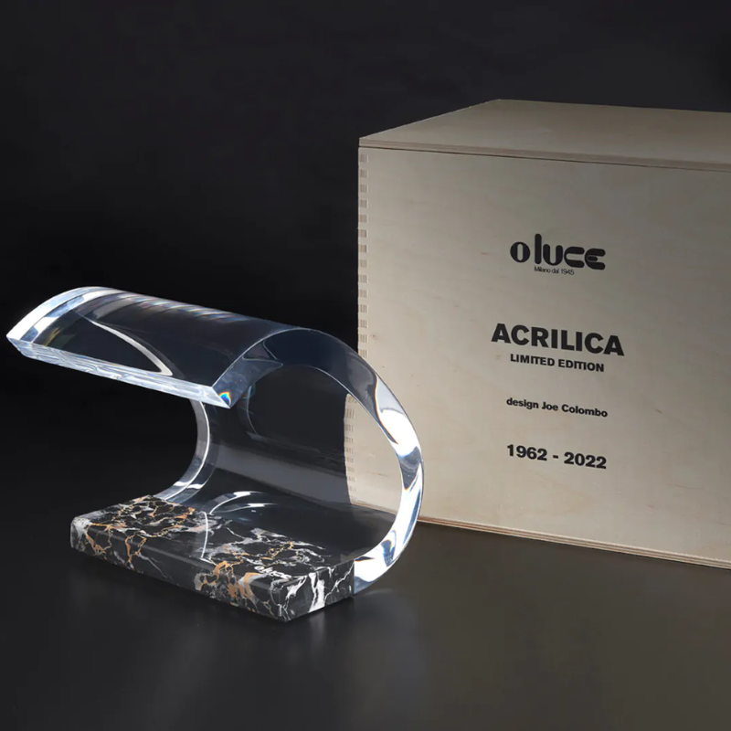 The Marble Acrilica Table Lamp from Oluce with it's packaging.