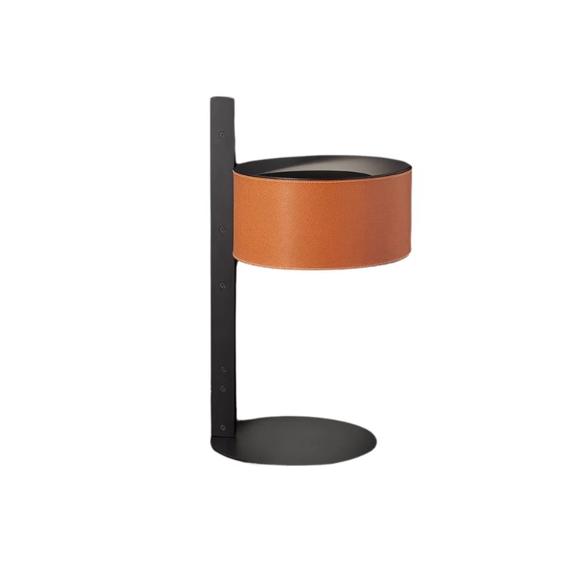 The Parallel Table Lamp from Oluce in brown leather.