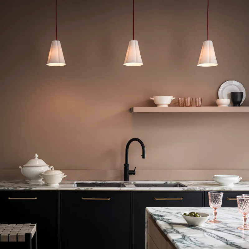 The Blossom Pendant from Original BTC in a kitchen and dining setting.