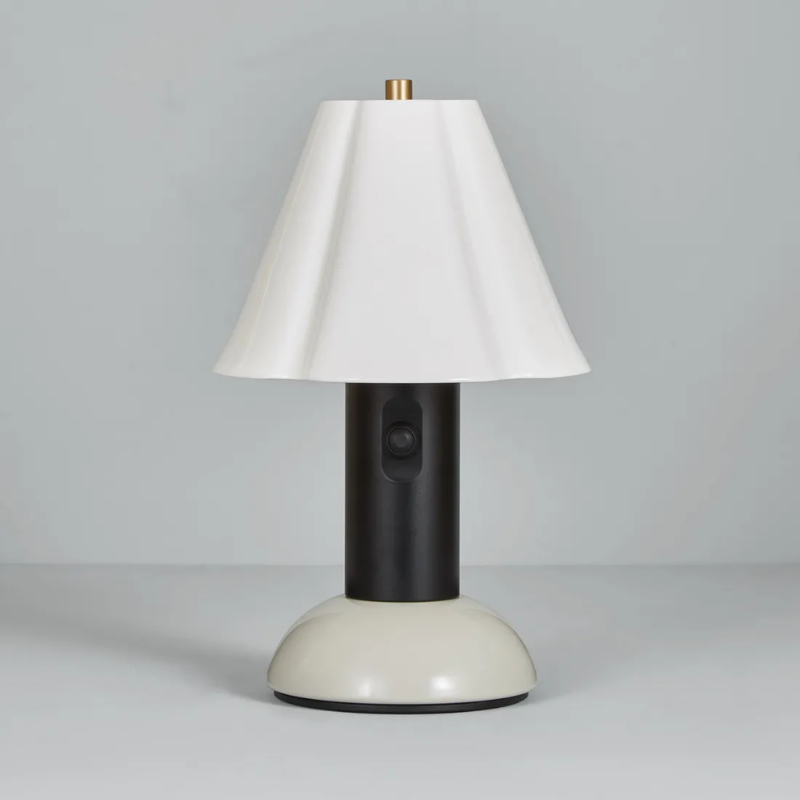 The Blossom Portable Light from Original BTC in putty grey in a studio.