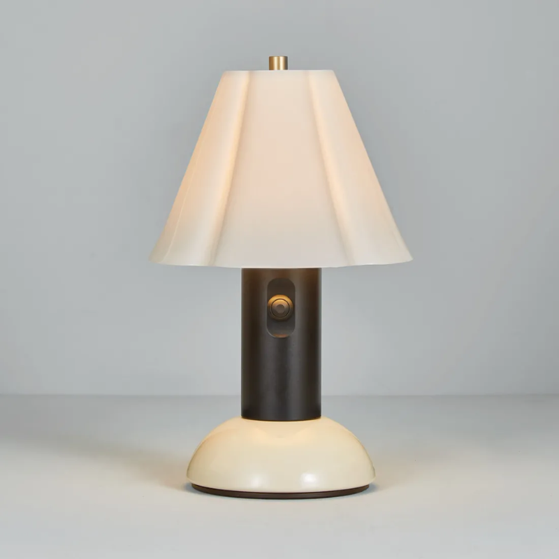 The Blossom Portable Light from Original BTC in putty grey turned on.