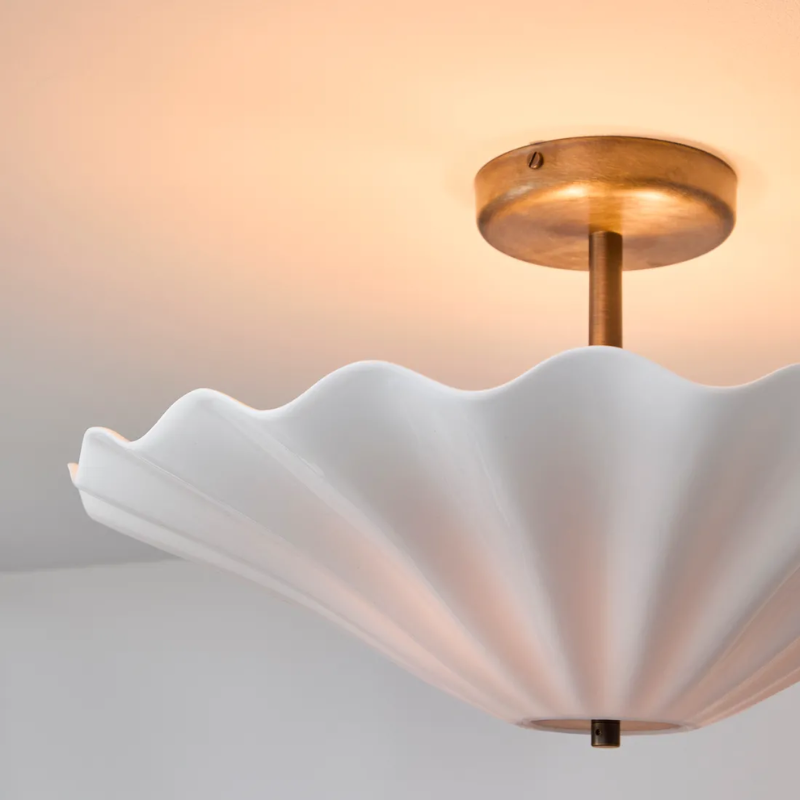 The Christie Ceiling Light from Original BTC turned on close up.