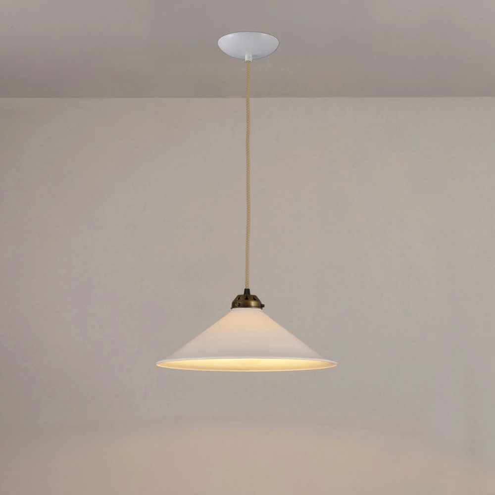 The large antique brass Cobb Pendant from Original BTC turned on.