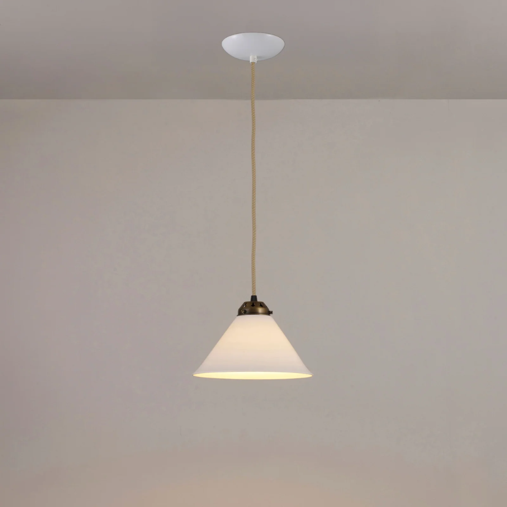 The small antique brass Cobb Pendant from Original BTC turned on.