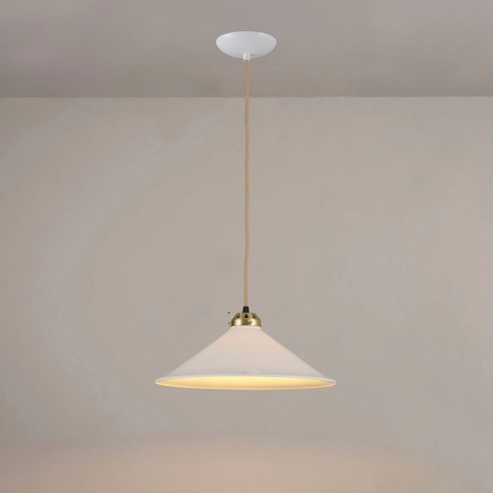 The large chrome Cobb Pendant from Original BTC turned on.